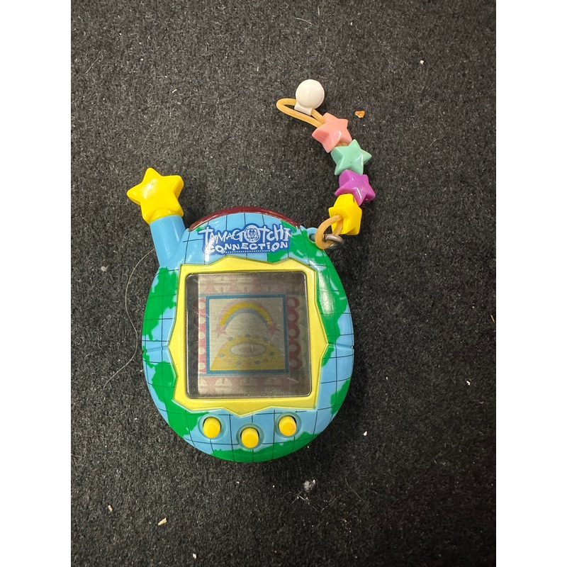TAMAGOTCHI BLUE AND YELLOW