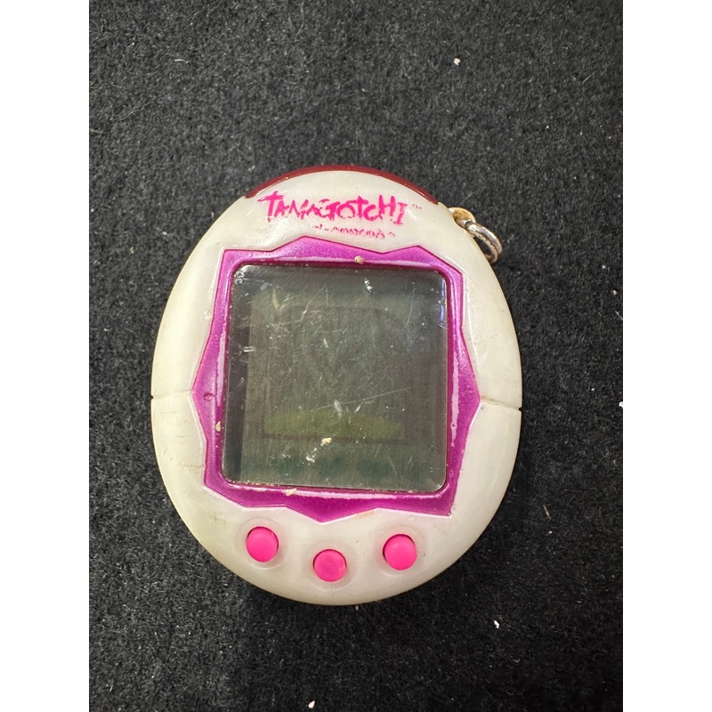 TAMAGOTCHI WHITE AND PURPLE