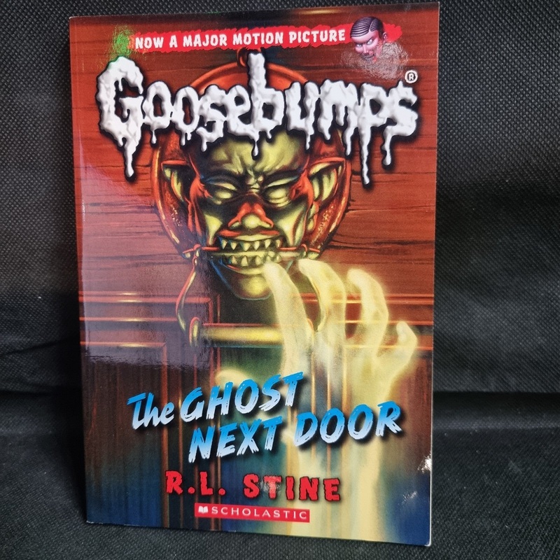 The Ghost Next Door *Goosebumps* Paperback Book: Stine, R.L.