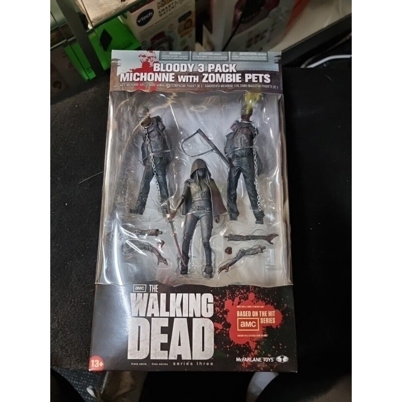 The Walking Dead Bloody 3 Pack Michonne With Zombie Pets McFarlane