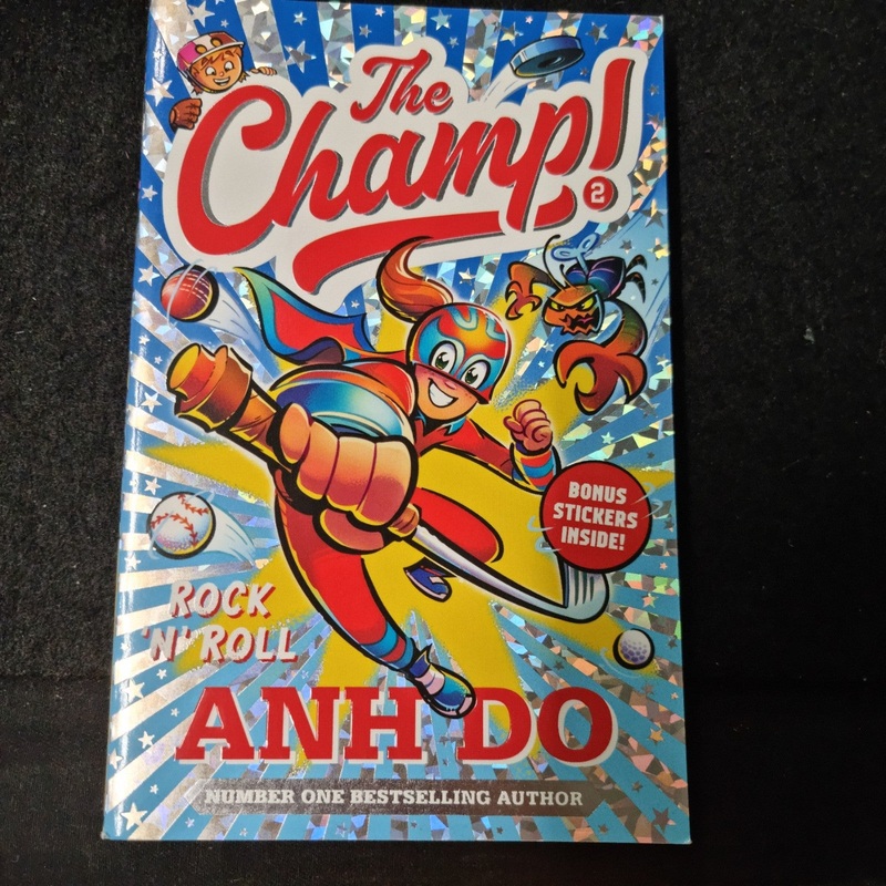 The Champ  Rock ‘N’ Roll  Vol 2 By ANH DO Pre-Owned Good Condition Novel